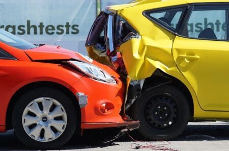 Car accident scene in Jakarta with damaged vehicles on the road, Safe Driving