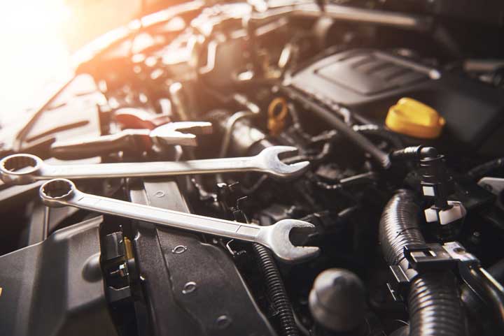 Mechanic performing car servicing in Jakarta garage