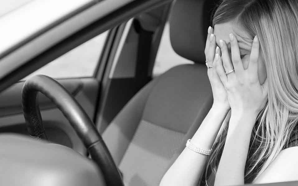 Learner driver overcoming car driving phobia with the help of an experienced instructor in Indonesia.