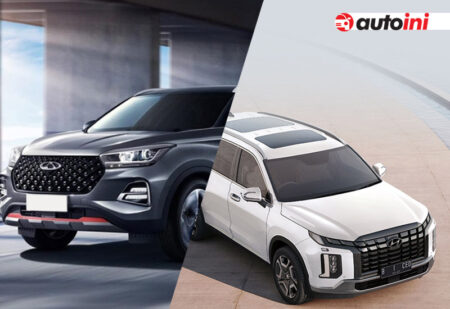 Two SUVs side by side; the left one is black with a diamond-pattern grille, and the right one is white with a large, bold grille, featuring the "autoini" logo in the top right corner.