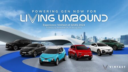 A promotional image for VinFast's participation in GIIAS 2024, showcasing several VinFast car models against a modern architectural background.