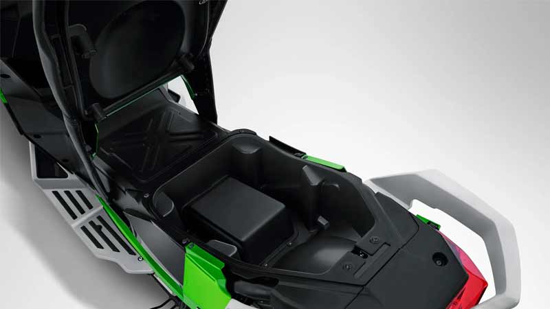 Open storage compartment under the seat of the ALVA CARVO motorcycle