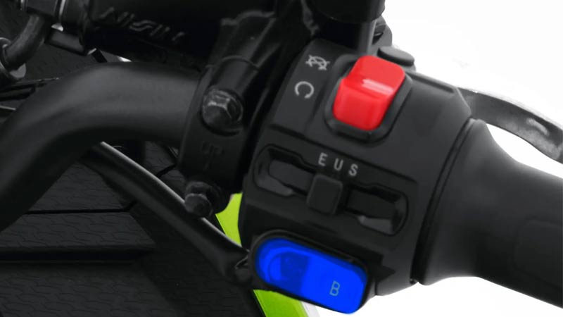 ALVA CARVO motorcycle's handlebar control panel with various buttons.