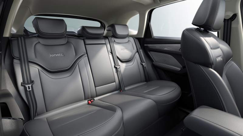Rear passenger compartment of a Haval Jolion SUV with black leather seats and headrests.