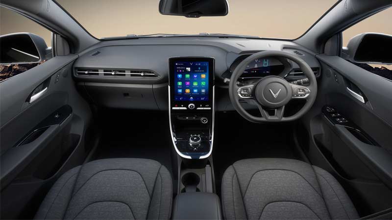 Interior of a VinFast VF31 electric car featuring a minimalist dashboard