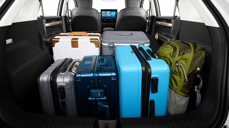 Luggage packed in the rear cargo area of the Wuling Cloud EV.