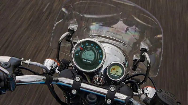 A close-up of a Royal Enfield Meteor motorcycle's instrument cluster. - autoini