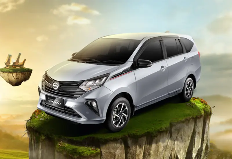 Front and side view of the 2025 Daihatsu Sigra MPV in silver color