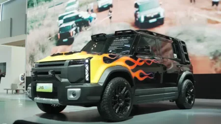 Chery J6 modified SUV with custom roof rack, side ladder, and 20-inch wheels at GIIAS 2025